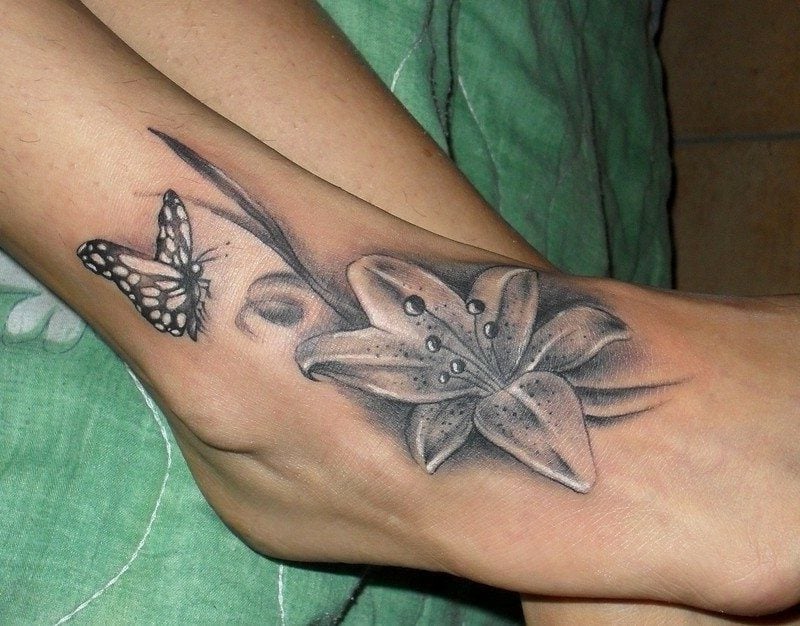 tattoo Fuss Lilie und Schmetterling