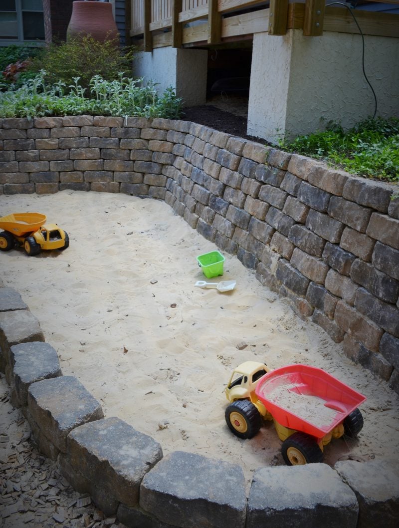Sandkasten bauen DIY Steine 