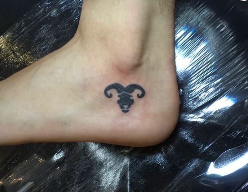widder tattoo black ink aries tattoo on heel