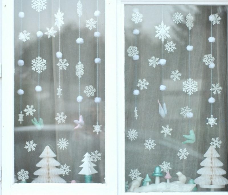 zauberhafte Fensterbilder zu Weihnachten Schneeflocken selber gebastelt