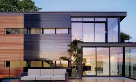 Resysta-Haus-Sofa-Baum-Holz-Fassade-Villa-Landhaus