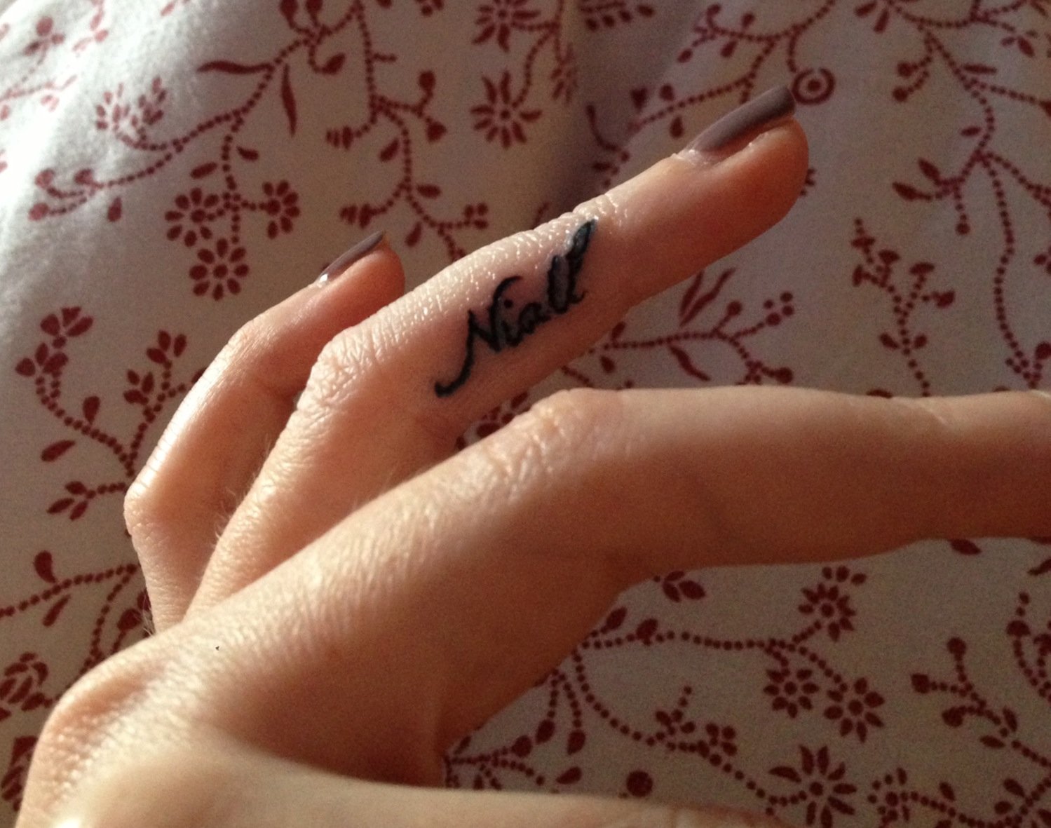 Tattoo namen am Finger 