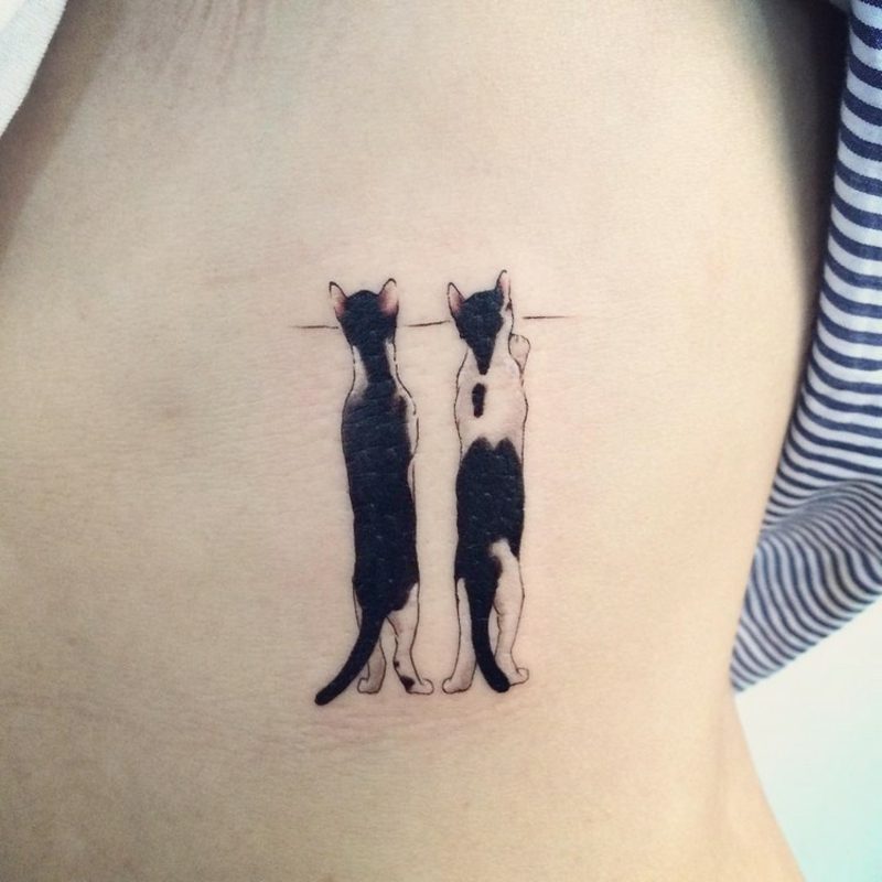 Tattoo Katze zwei zaun neugierig