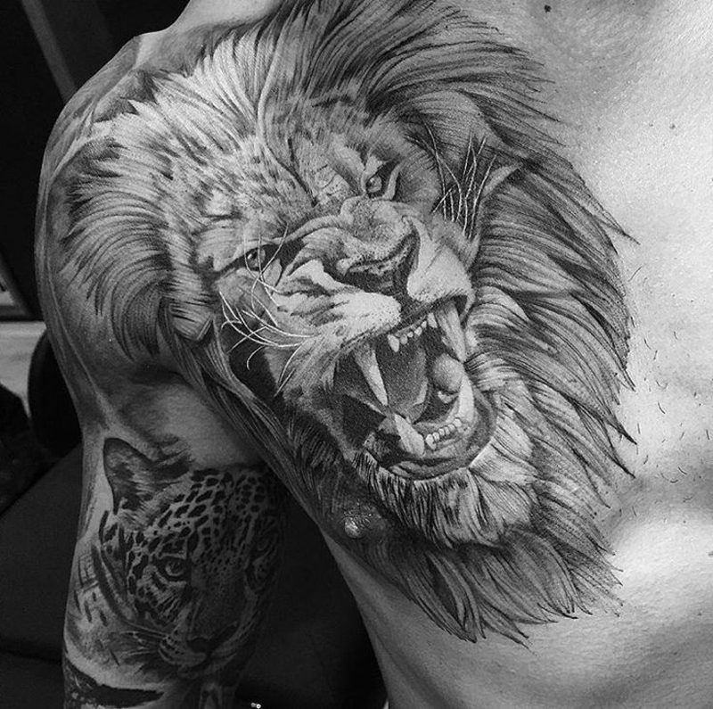 Tattoo Löwe Tiger Brust Oberarm