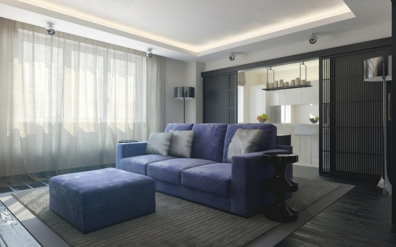 stilvolles Wohnzimmer blaues Sofa LED-Streifen