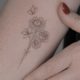 Fineline Tattoo: zarte Motive, die nicht leise sein müssen